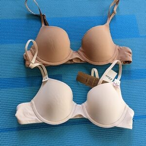 2 Pairs of tan ETAM Bras 32A NWT
